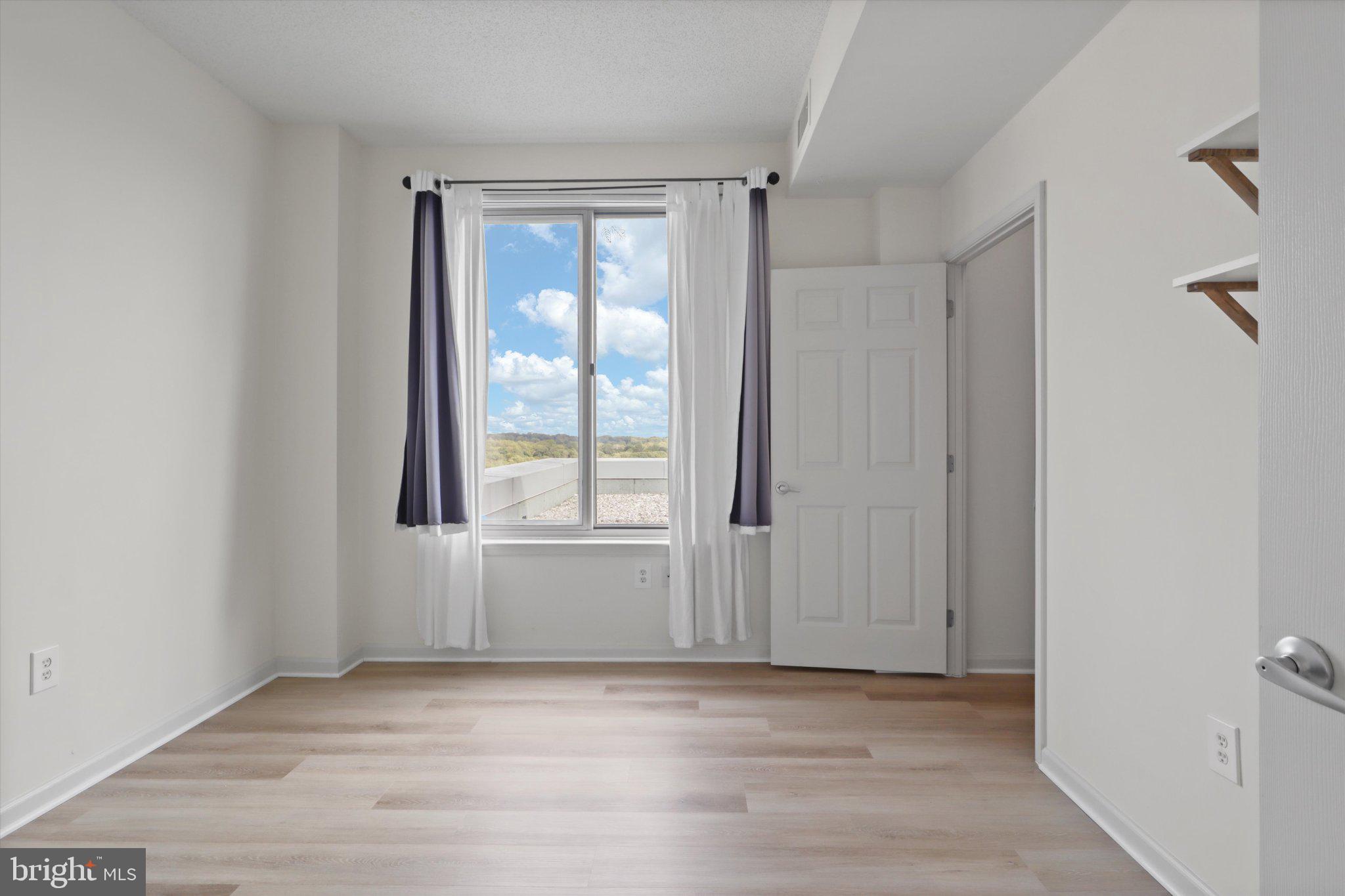 2726 Gallows Road, Unit 1506 Vienna, VA 22180 - Photo 17 of 35 Bright and airy room with scenic views.