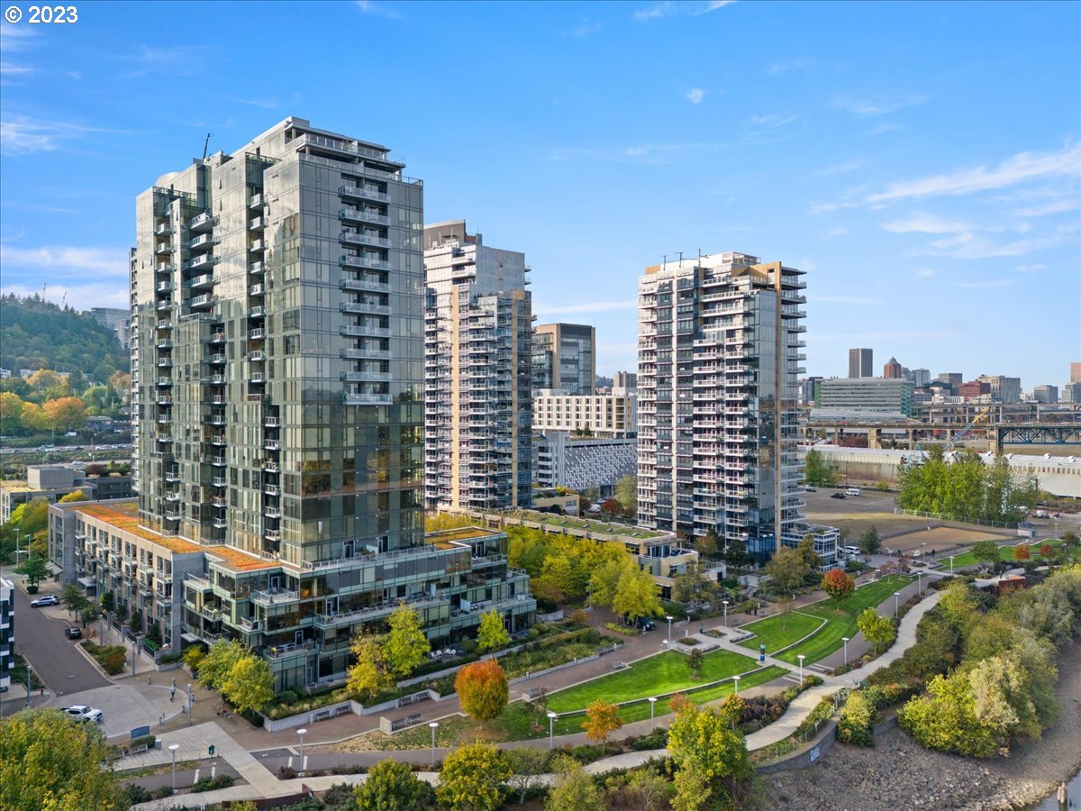 a view of a city with tall buildings