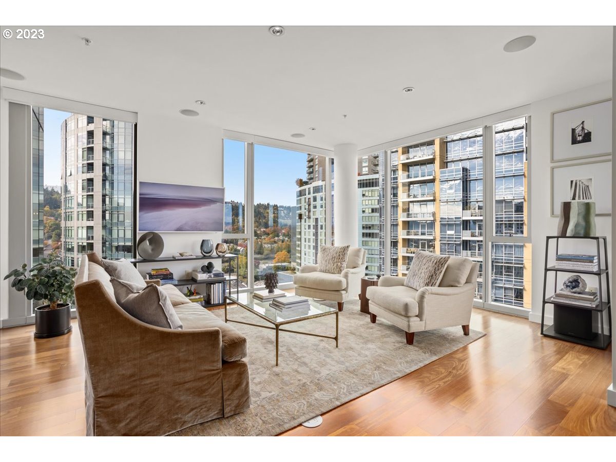 841 Southwest Gaines Street, Unit 1800 Portland, OR 97239 - Photo 11 of 39 a living room with furniture and a large window