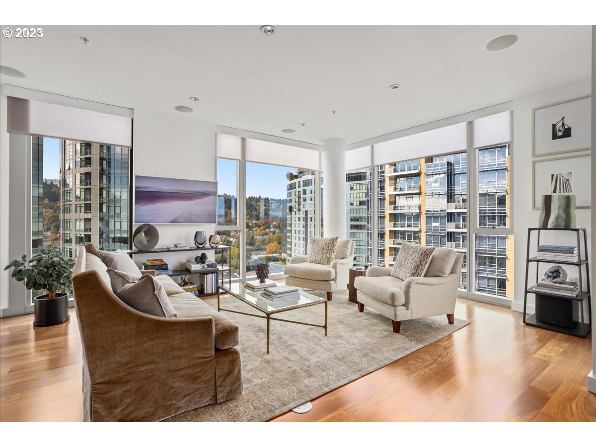 841 Southwest Gaines Street, Unit 1800 Portland, OR 97239 - Photo 12 of 39 a living room with furniture and a large window