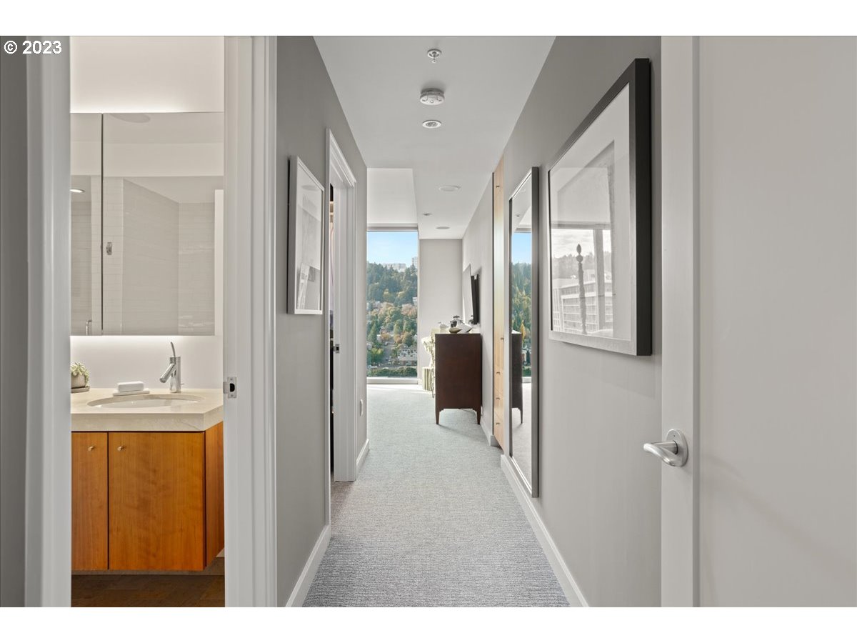 841 Southwest Gaines Street, Unit 1800 Portland, OR 97239 - Photo 22 of 39 a view of a bathroom from the hallway