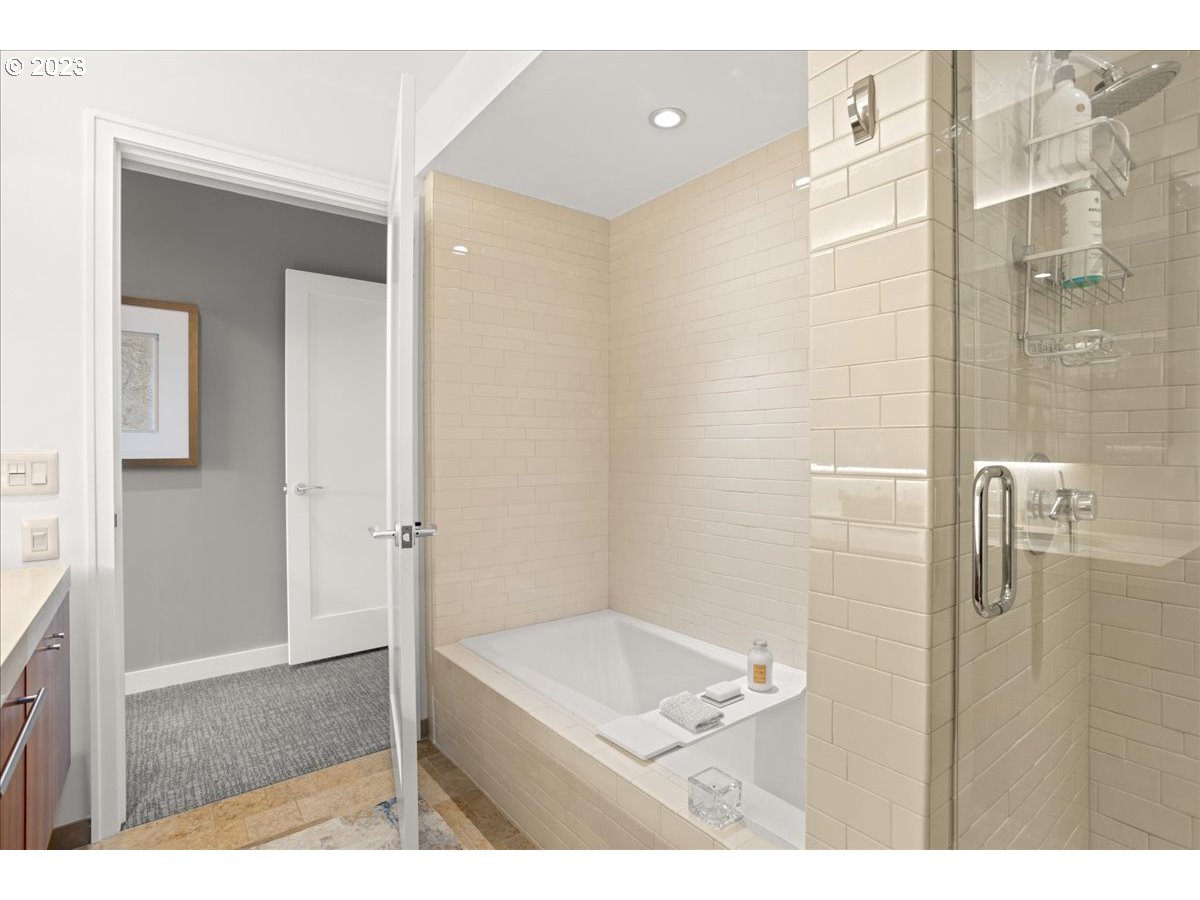 841 Southwest Gaines Street, Unit 1800 Portland, OR 97239 - Photo 28 of 39 a bathroom with a shower