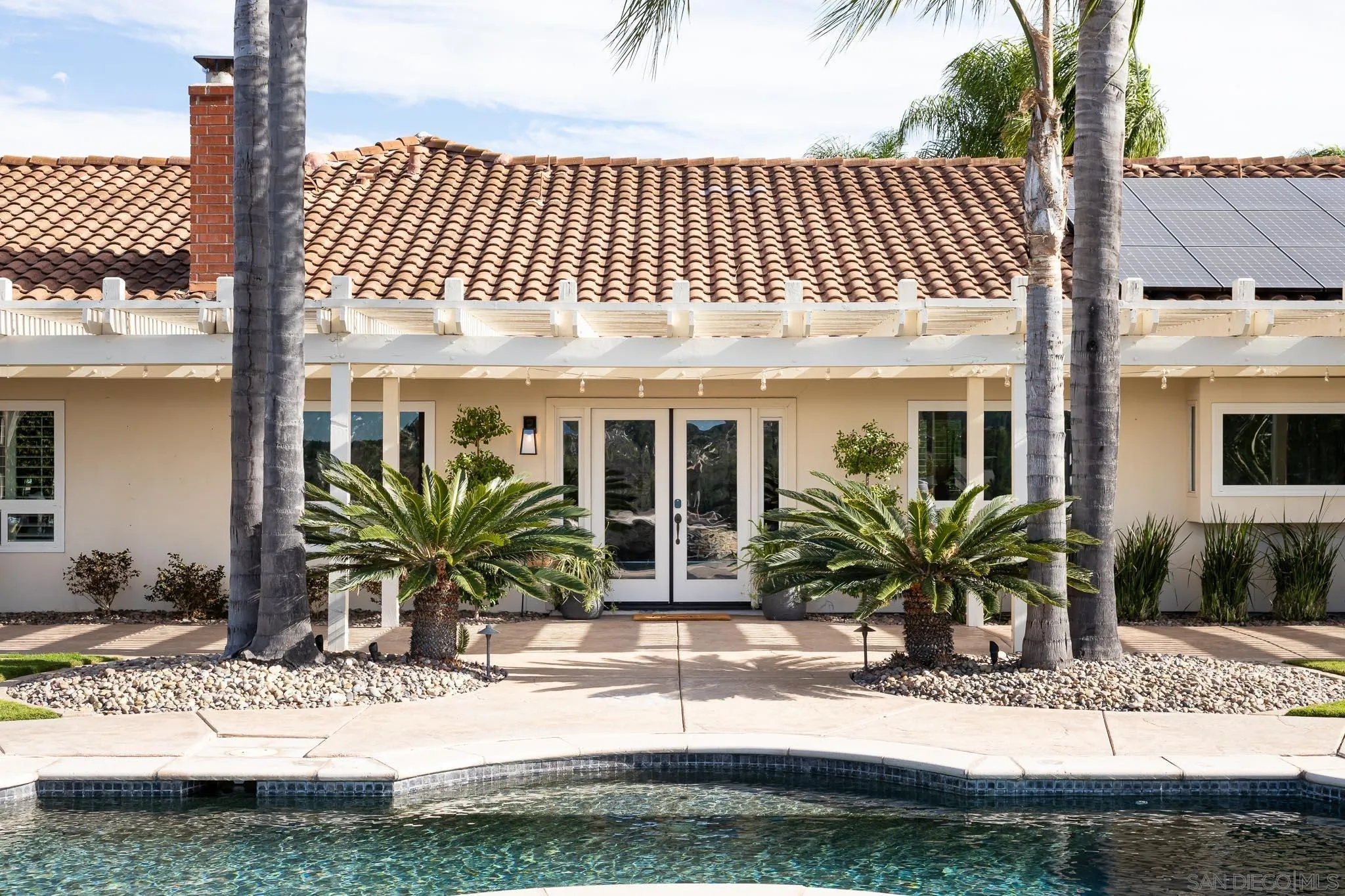 12645 Treehill Place Poway, CA 92064 - Photo 2 of 52 a front view of a house with garden