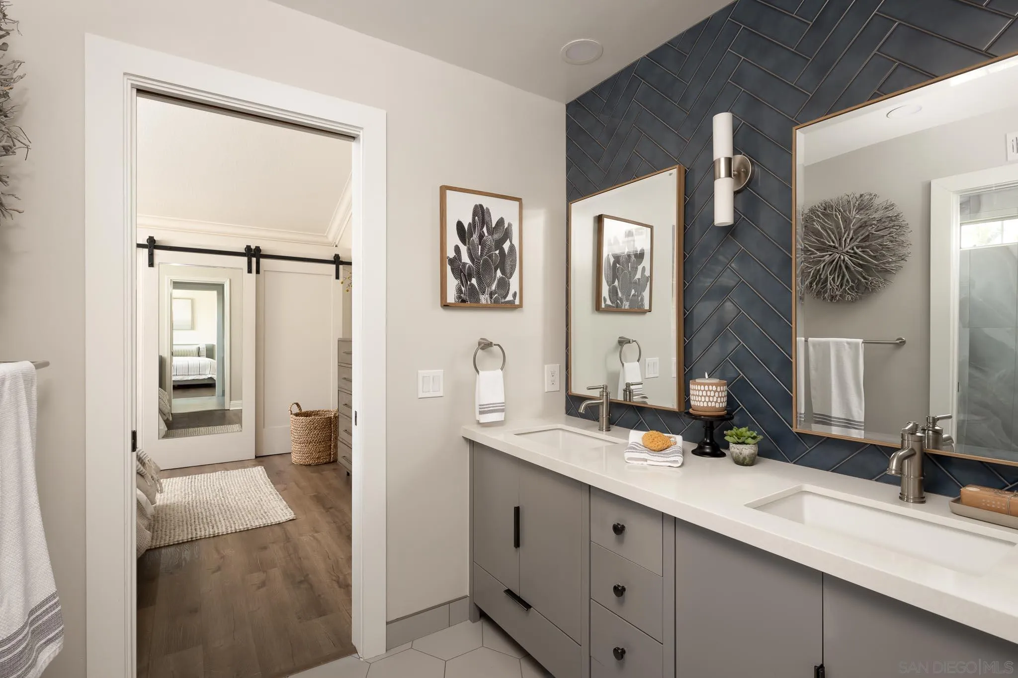 12645 Treehill Place Poway, CA 92064 - Photo 27 of 52 a bathroom with a double vanity sink mirror and