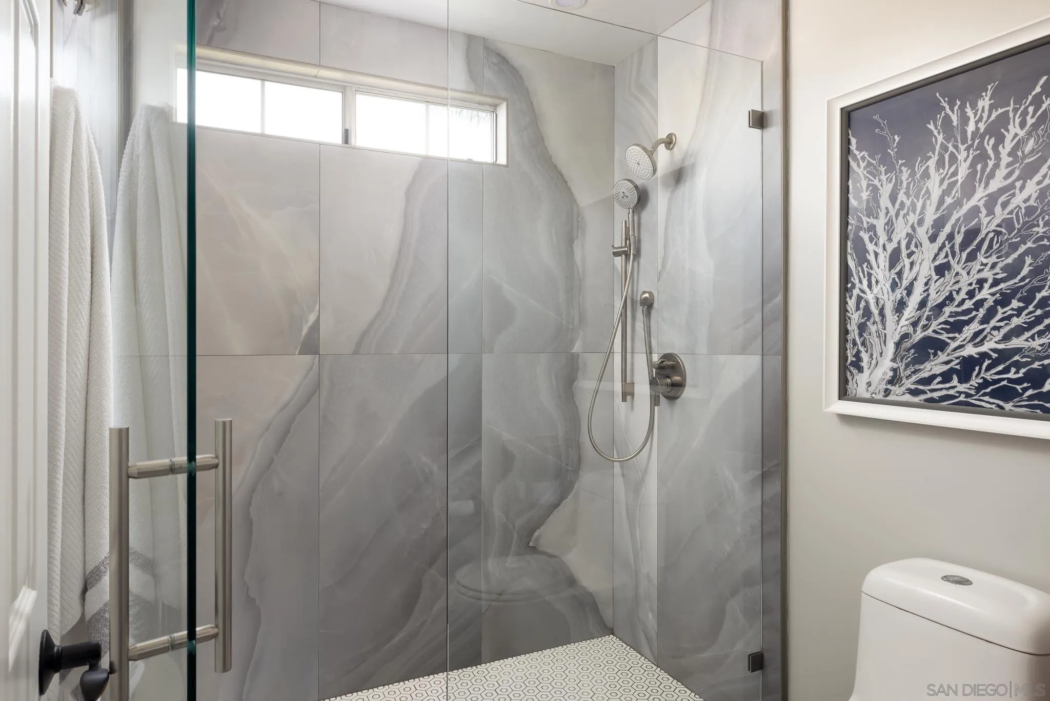 12645 Treehill Place Poway, CA 92064 - Photo 28 of 52 a bathroom with a shower