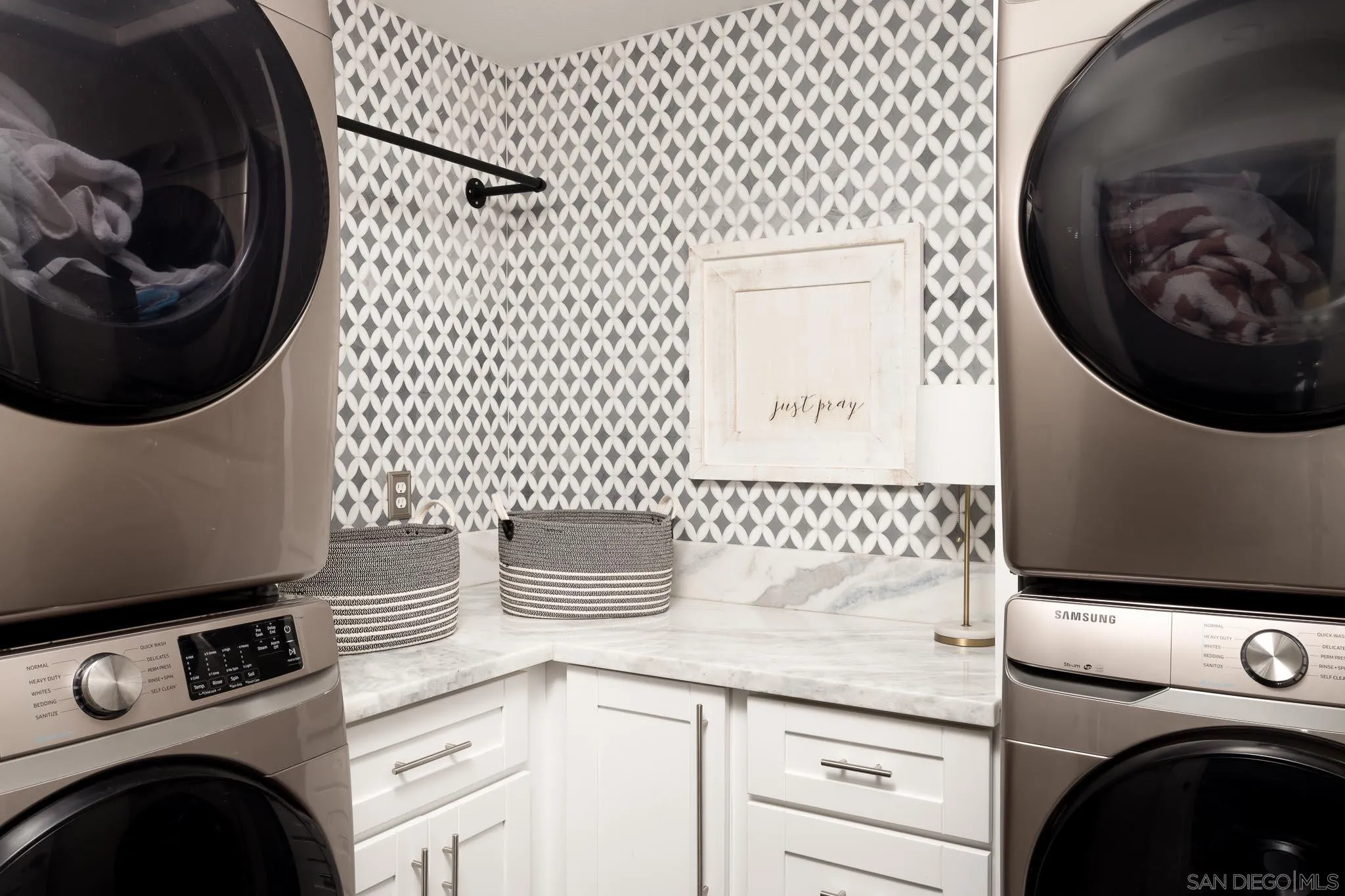 12645 Treehill Place Poway, CA 92064 - Photo 34 of 52 a utility room with dryer and washer