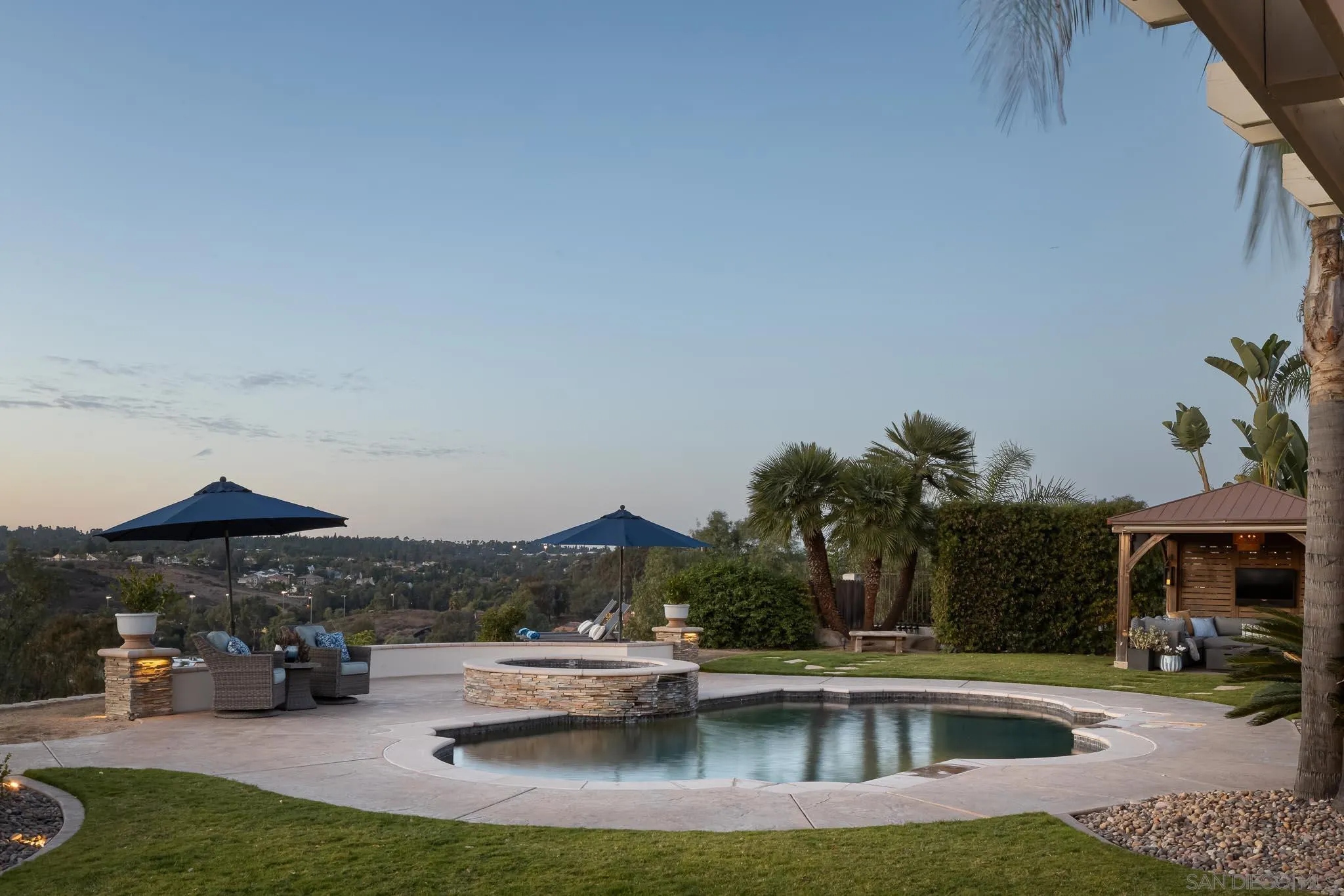 12645 Treehill Place Poway, CA 92064 - Photo 40 of 52 a view of swimming pool and outdoor seating