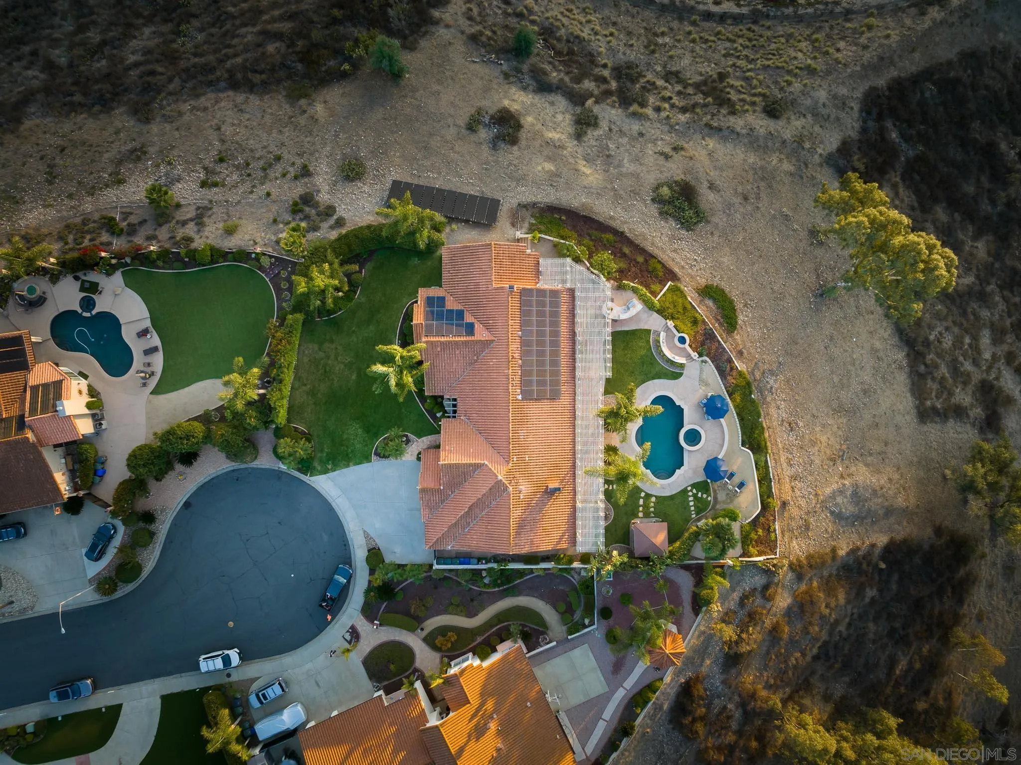 12645 Treehill Place Poway, CA 92064 - Photo 49 of 52 an aerial view of a house with a yard and trees