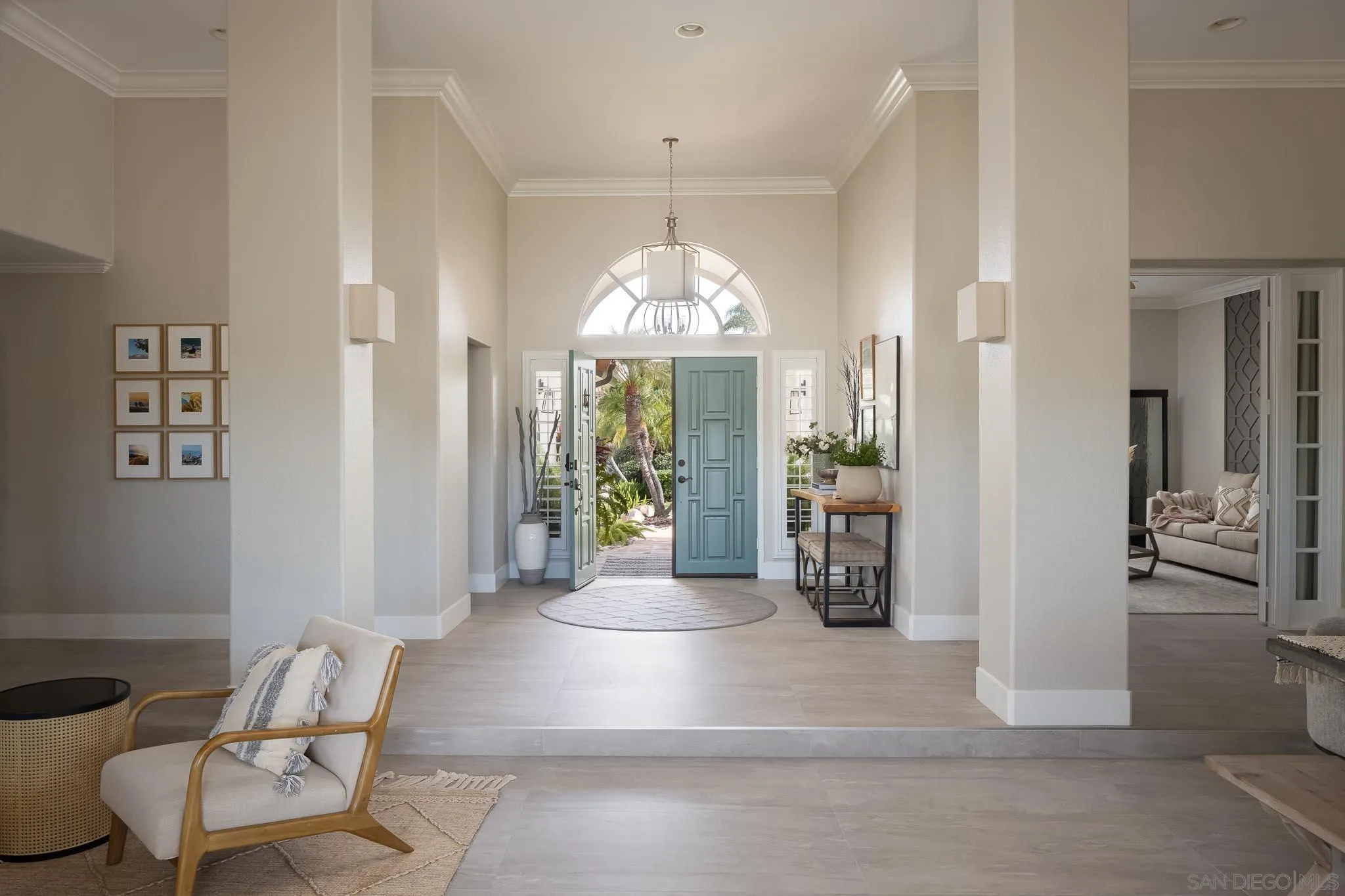 12645 Treehill Place Poway, CA 92064 - Photo 7 of 52 a living room with furniture and a chandelier