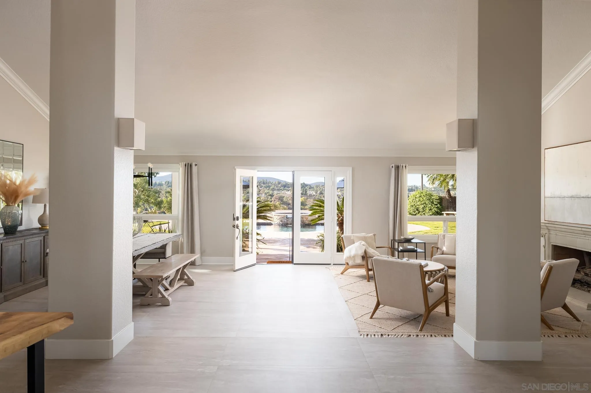 12645 Treehill Place Poway, CA 92064 - Photo 10 of 52 a living room with furniture and a large window with outer view