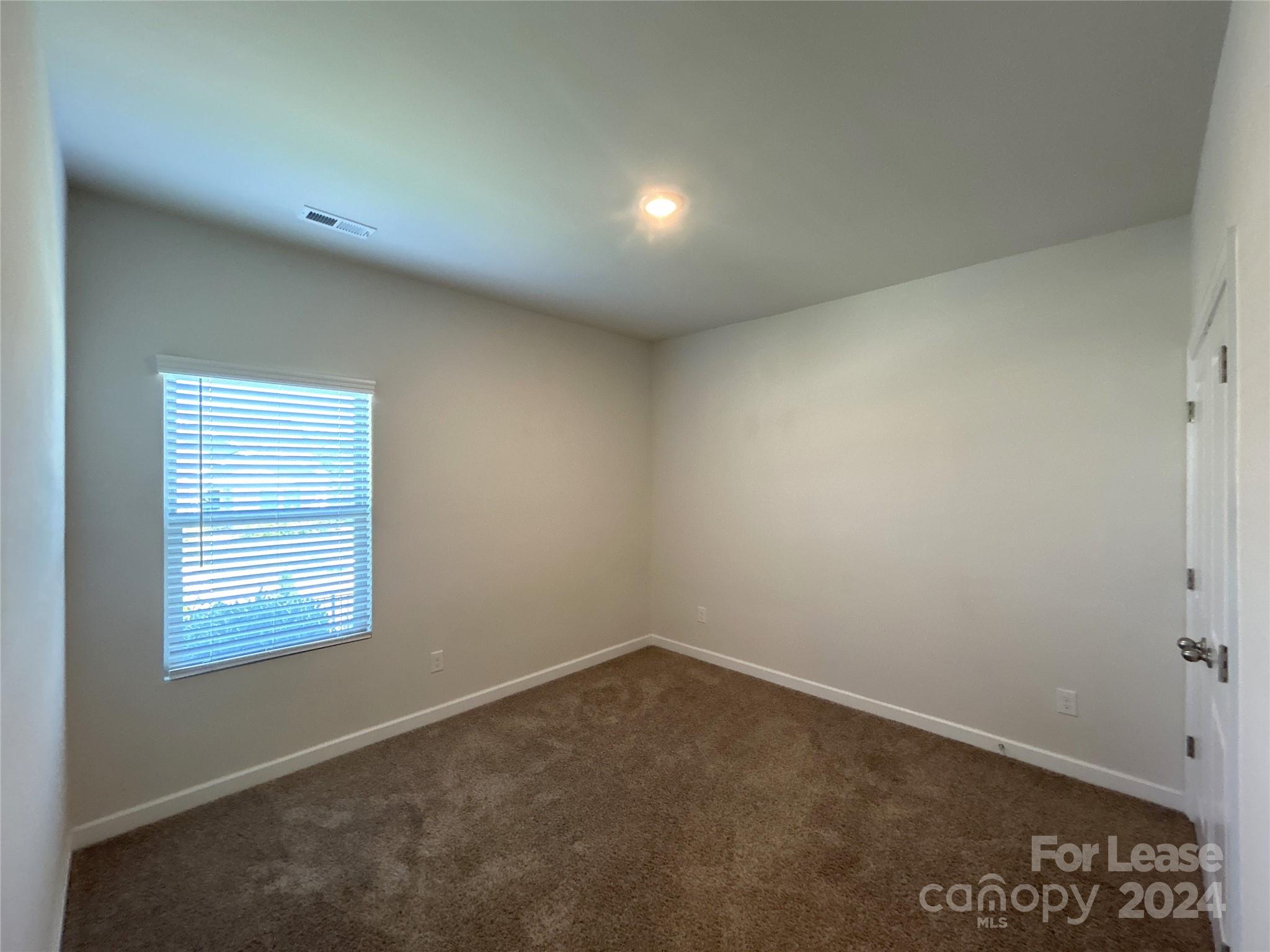 3801 Isenhour Road Kannapolis, NC 28081 - Photo 13 of 16 an empty room with a window