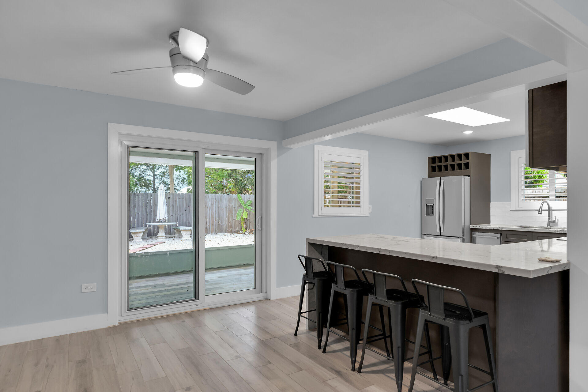 535 Plante Street Key Largo, FL 33037 - Photo 11 of 47 a view of a dining room and a table and chairs