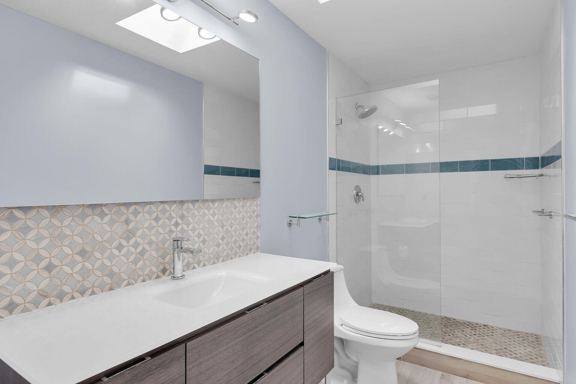 535 Plante Street Key Largo, FL 33037 - Photo 25 of 47 a bathroom with a sink a toilet and shower