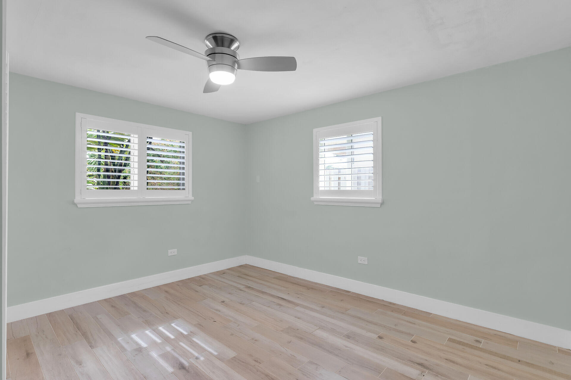 535 Plante Street Key Largo, FL 33037 - Photo 26 of 47 wooden floor in an empty room with a window