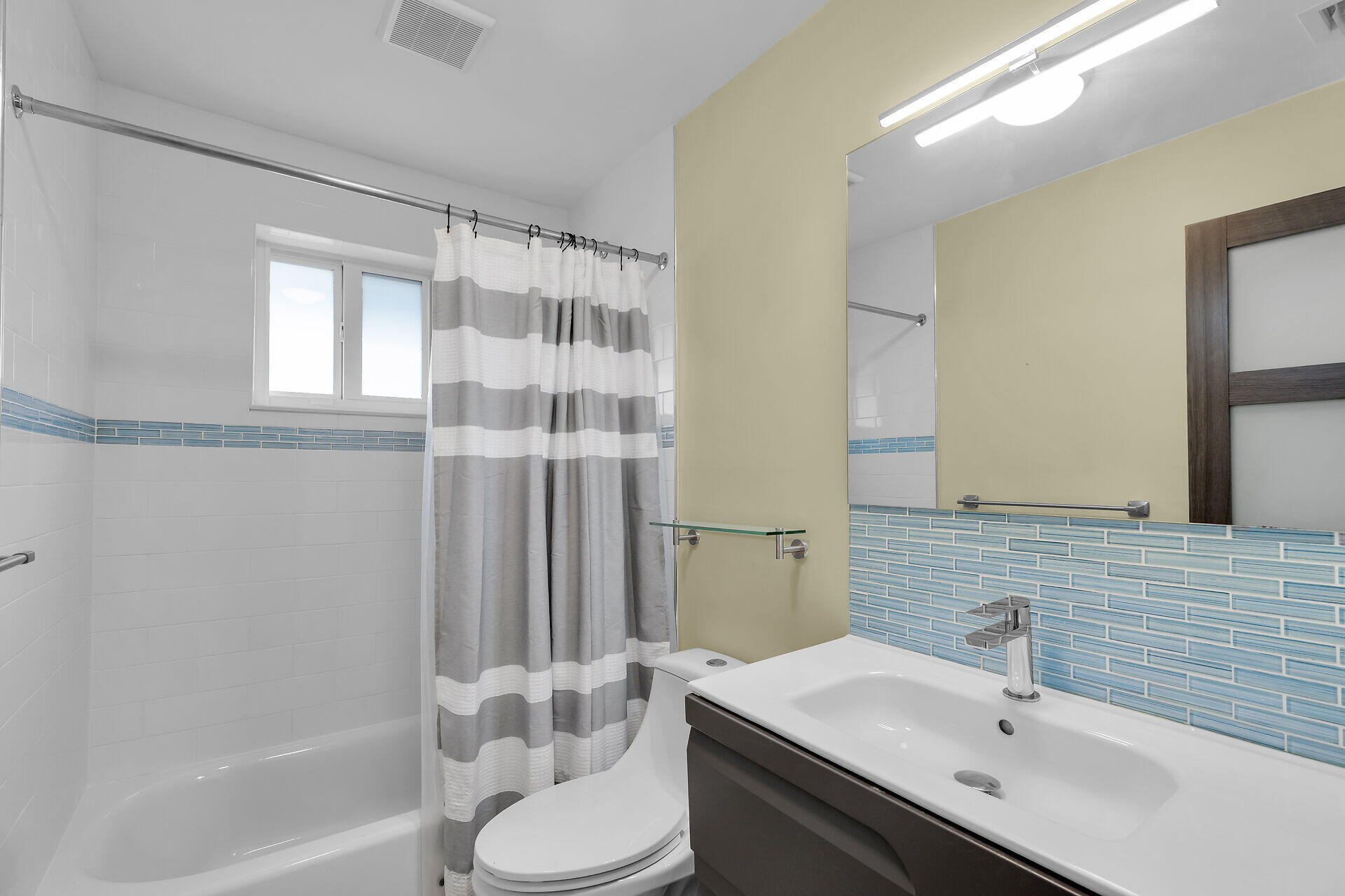 535 Plante Street Key Largo, FL 33037 - Photo 30 of 47 a bathroom with a sink toilet and shower