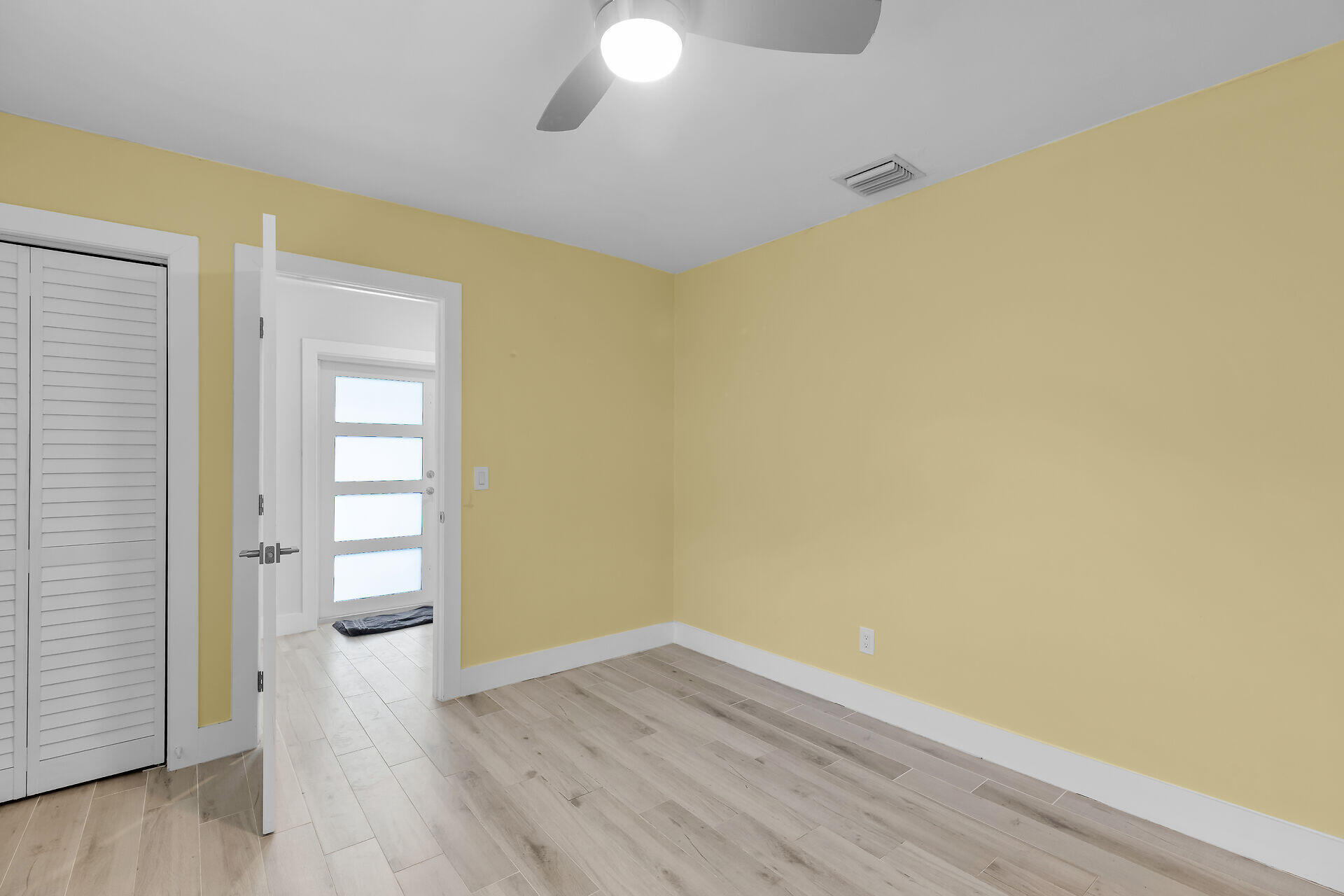 535 Plante Street Key Largo, FL 33037 - Photo 34 of 47 a view of empty room with wooden floor