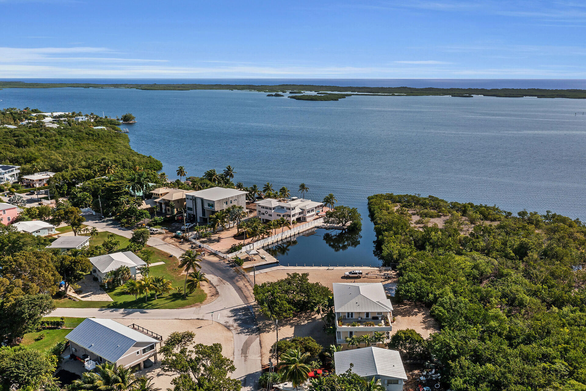 535 Plante Street Key Largo, FL 33037 - Photo 35 of 47 an aerial view of a house with a lake view