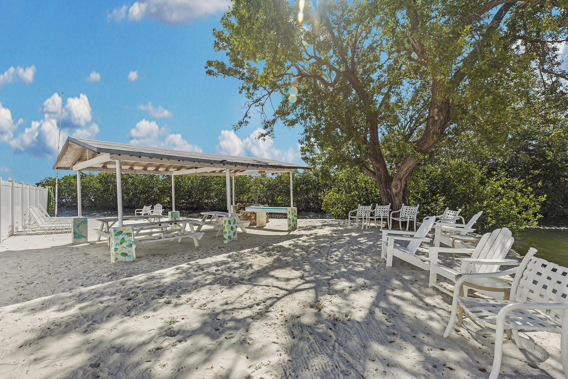535 Plante Street Key Largo, FL 33037 - Photo 43 of 47 a view of a house with backyard porch and sitting area
