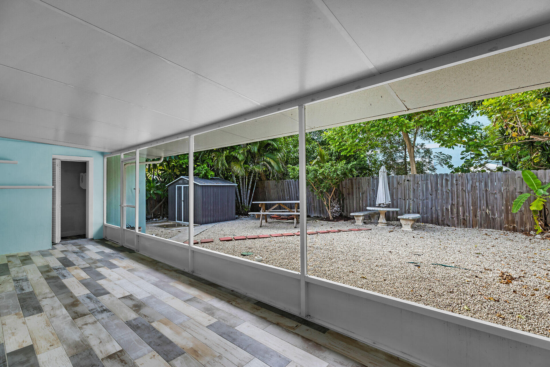 535 Plante Street Key Largo, FL 33037 - Photo 7 of 47 a view of a backyard with a sitting area