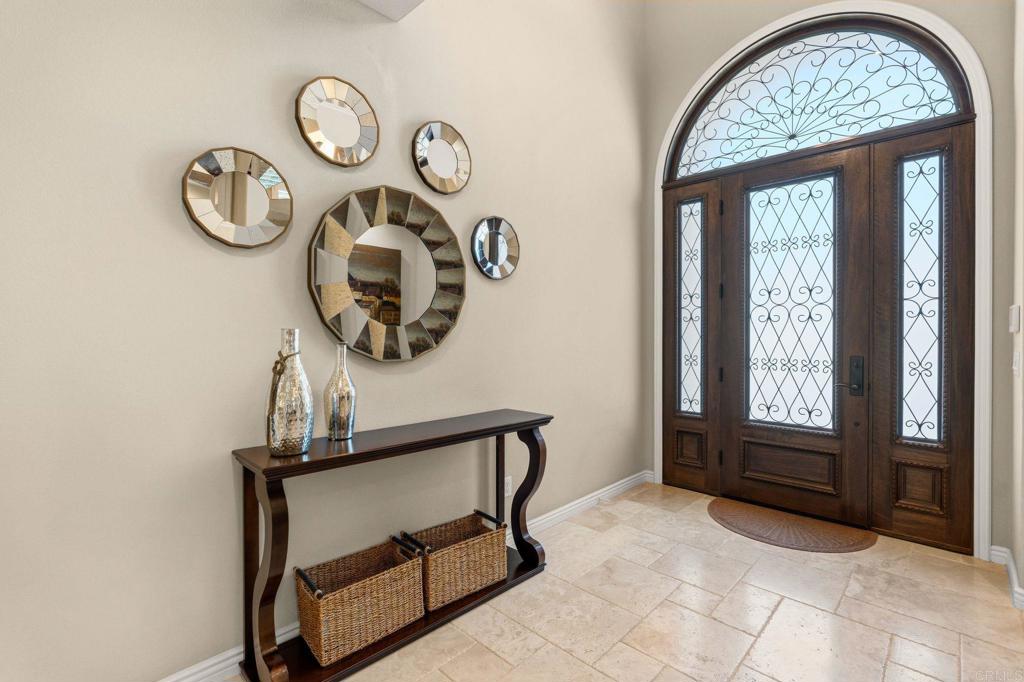 809 Dolphin Circle Encinitas, CA 92024 - Photo 10 of 71 a view of a hallway with entryway wooden floor and front door