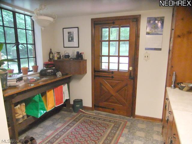 1130 South Hametown Road Akron, OH 44321 - Photo 7 of 24 Mudroom area off the kitchen with door leading to backyard.