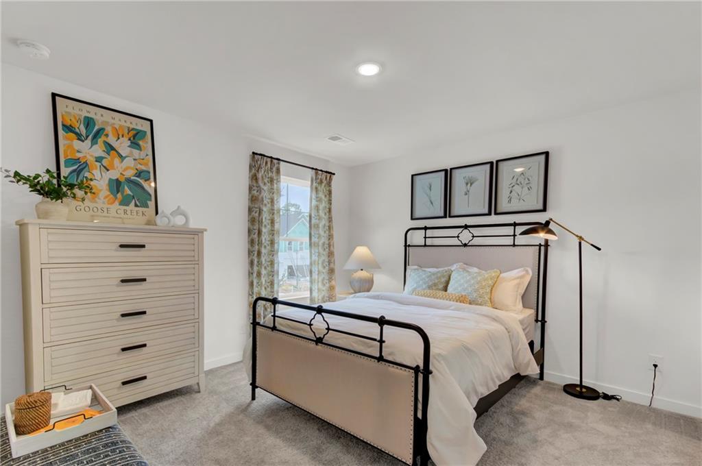 325 Cavalier Lane Acworth, GA 30102 - Photo 20 of 61 a bedroom with a bed and a dresser