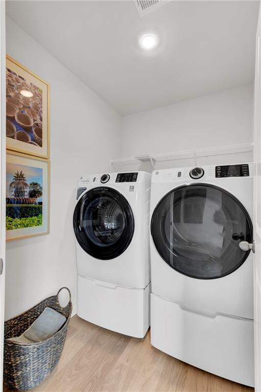 325 Cavalier Lane Acworth, GA 30102 - Photo 21 of 61 a utility room with sink dryer and washer