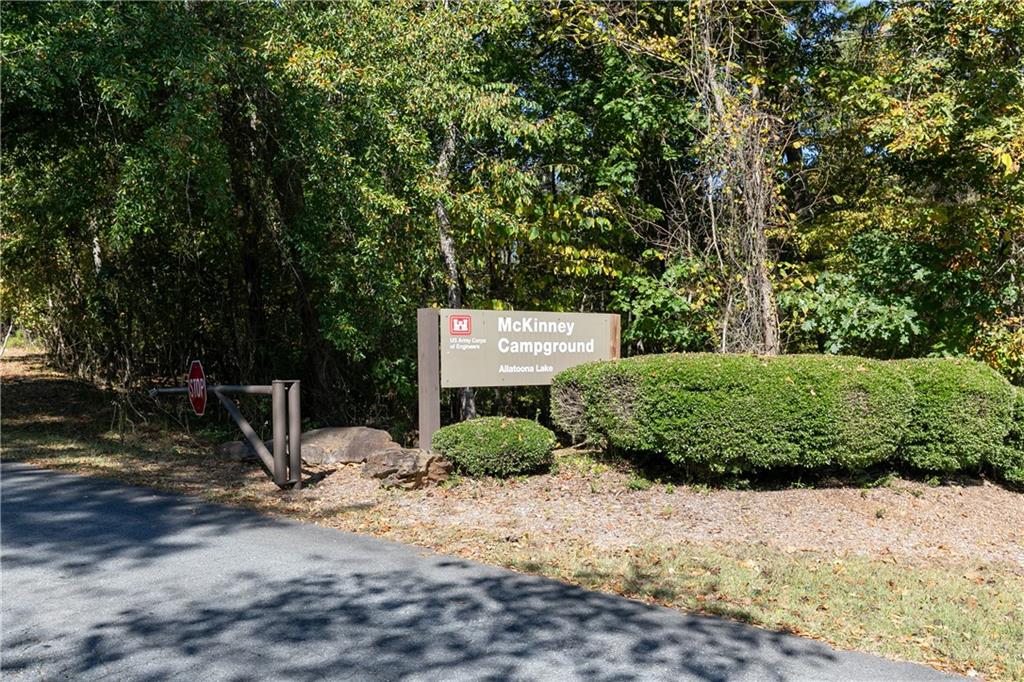 325 Cavalier Lane Acworth, GA 30102 - Photo 30 of 61 a view of a park with plants and large trees