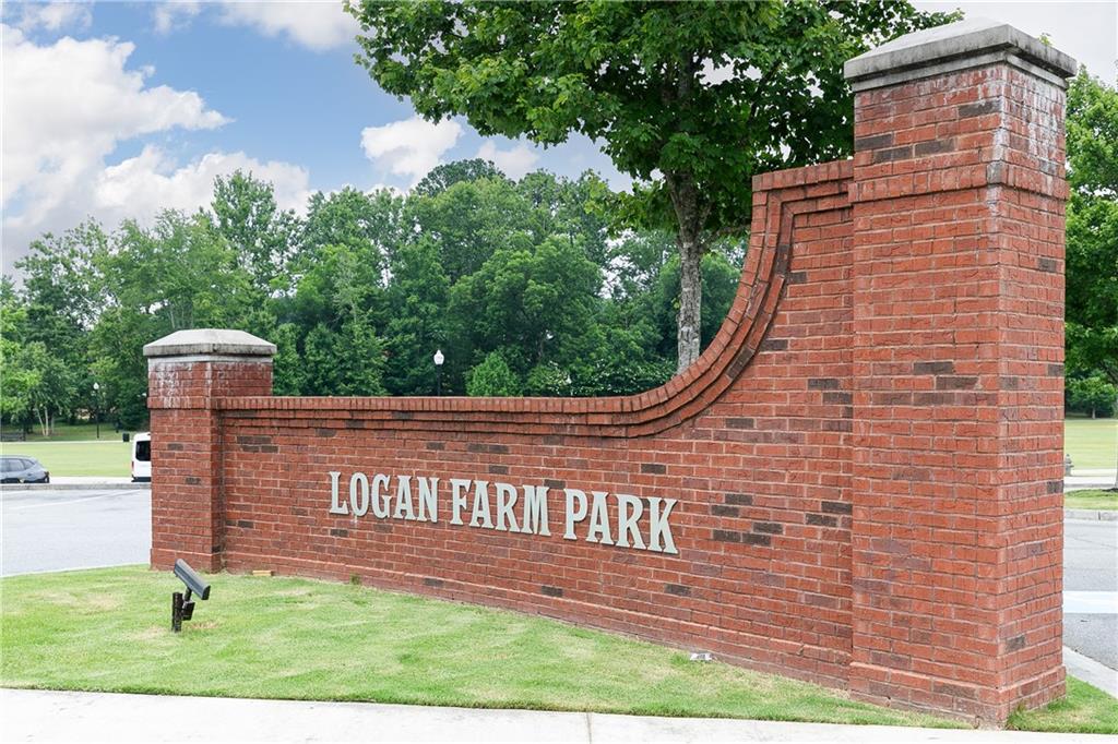 325 Cavalier Lane Acworth, GA 30102 - Photo 35 of 61 a view of a brick wall with a small yard