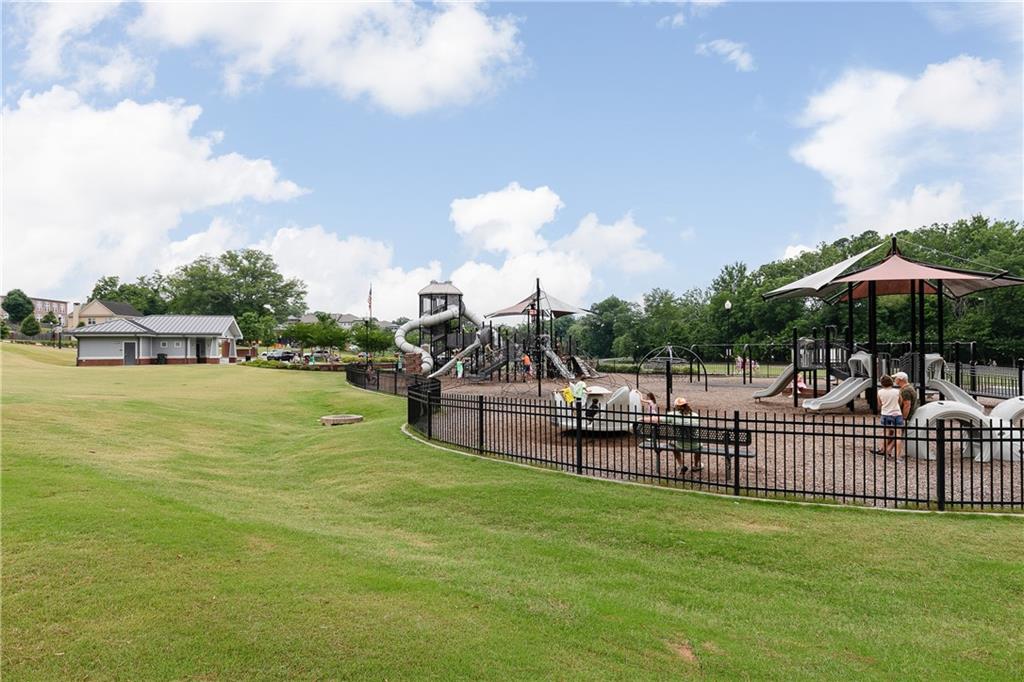 325 Cavalier Lane Acworth, GA 30102 - Photo 37 of 61 a view of a house with a yard and sitting area