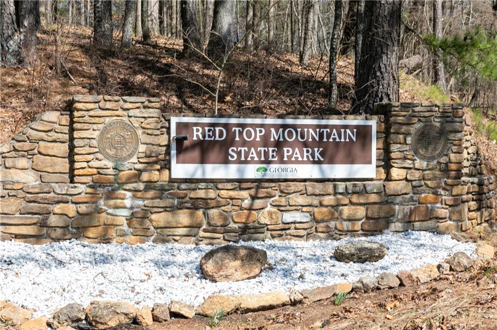 325 Cavalier Lane Acworth, GA 30102 - Photo 54 of 61 a street sign on a brick wall