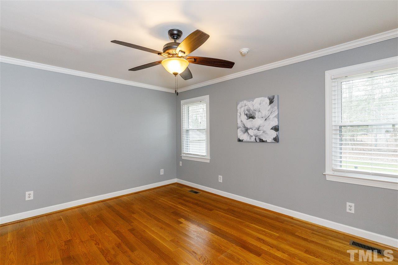 2921 Old Milburnie Road Raleigh, NC 27604 - Photo 11 of 27 a view of an empty room with a window