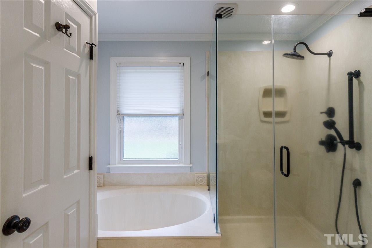 2921 Old Milburnie Road Raleigh, NC 27604 - Photo 13 of 27 a bathroom with a shower