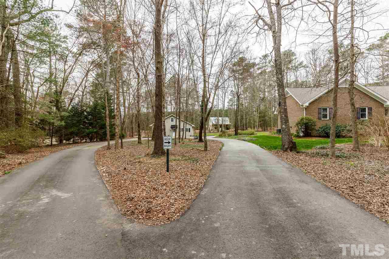 2921 Old Milburnie Road Raleigh, NC 27604 - Photo 20 of 27 a view of outdoor space with trees