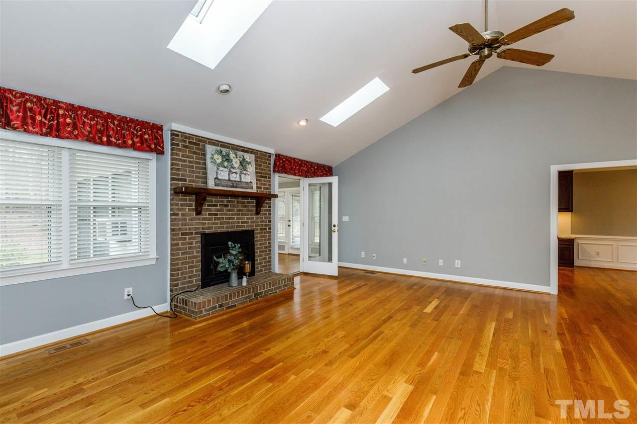 2921 Old Milburnie Road Raleigh, NC 27604 - Photo 3 of 27 a view of an empty room with window and fire place