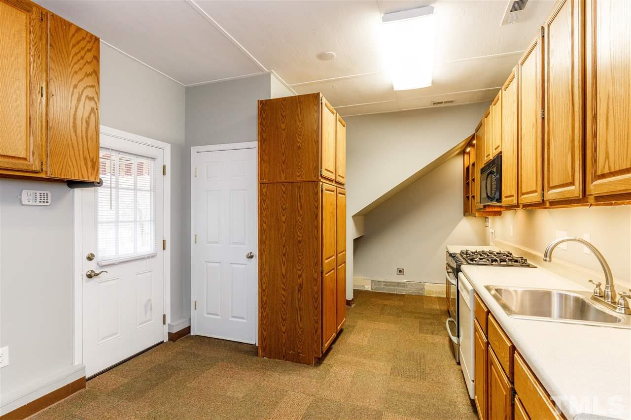 2921 Old Milburnie Road Raleigh, NC 27604 - Photo 24 of 27 a view of a storage and utility room with a sink