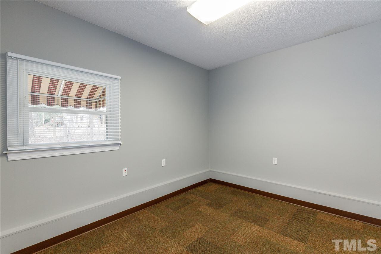 2921 Old Milburnie Road Raleigh, NC 27604 - Photo 27 of 27 a view of an empty room with a window