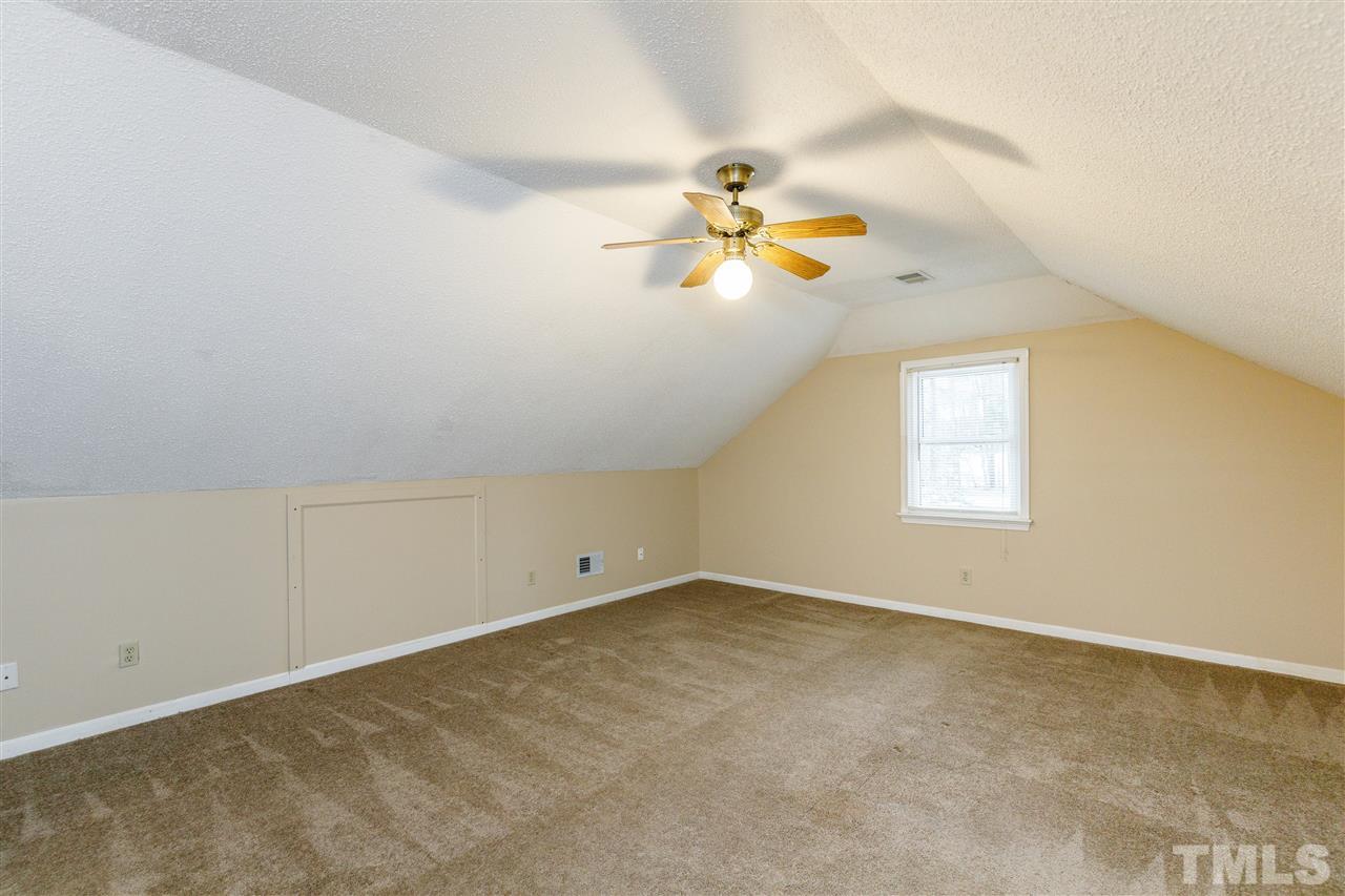 2921 Old Milburnie Road Raleigh, NC 27604 - Photo 10 of 27 an empty room with a window