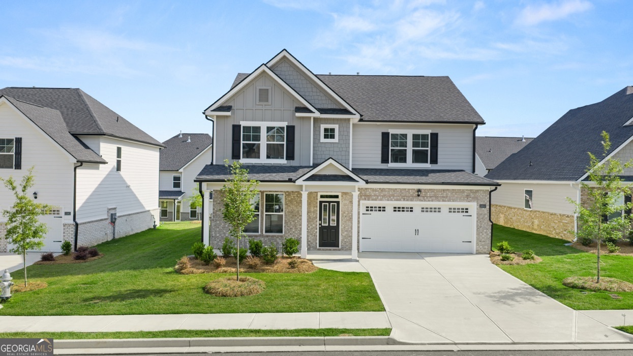 13604 Whitman Lane Covington, GA 30014 - Photo 1 of 52 a front view of a house with a yard