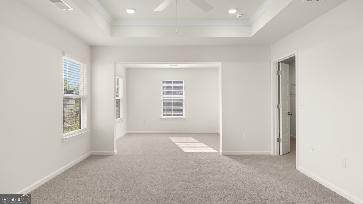 13604 Whitman Lane Covington, GA 30014 - Photo 13 of 52 an empty room with windows