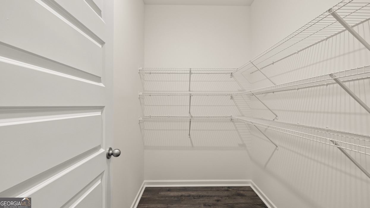 13604 Whitman Lane Covington, GA 30014 - Photo 25 of 52 a view of a room with racks on the wall