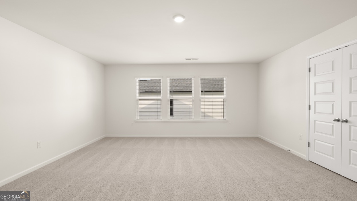 13604 Whitman Lane Covington, GA 30014 - Photo 37 of 52 an empty room with a window