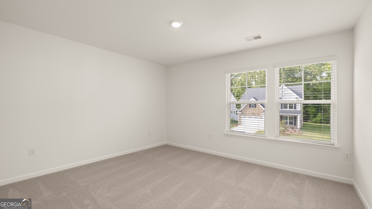 13604 Whitman Lane Covington, GA 30014 - Photo 46 of 52 an empty room with a window