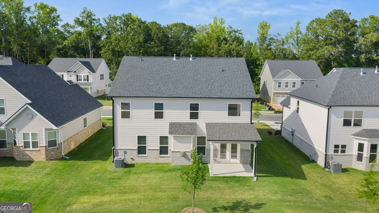 13604 Whitman Lane Covington, GA 30014 - Photo 52 of 52 an aerial view of a house with a yard