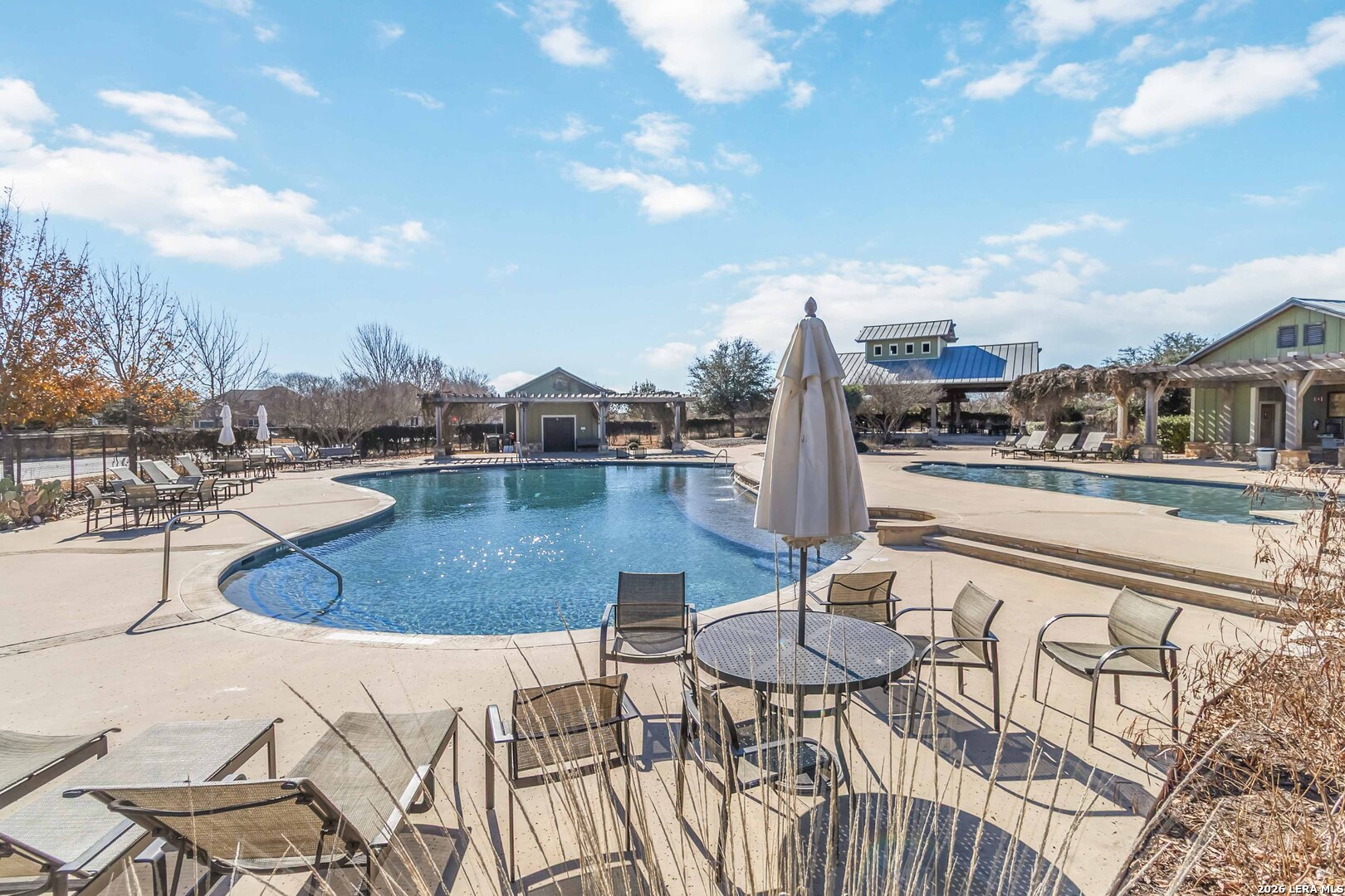 8024 Trail Grant Schertz, TX 78154 - Photo 19 of 20 a view of a swimming pool with outdoor seating