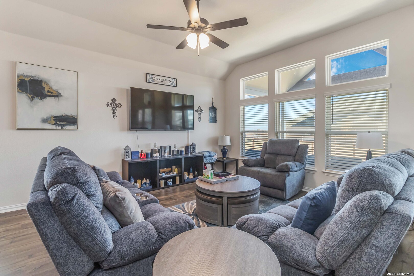8024 Trail Grant Schertz, TX 78154 - Photo 3 of 20 a living room with furniture a flat screen tv and a window