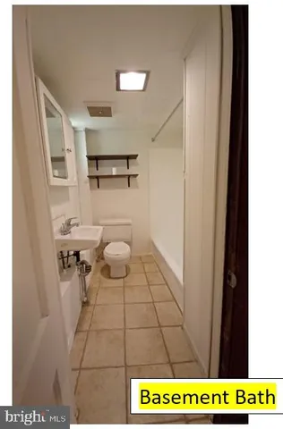 a view of bathroom with a toilet