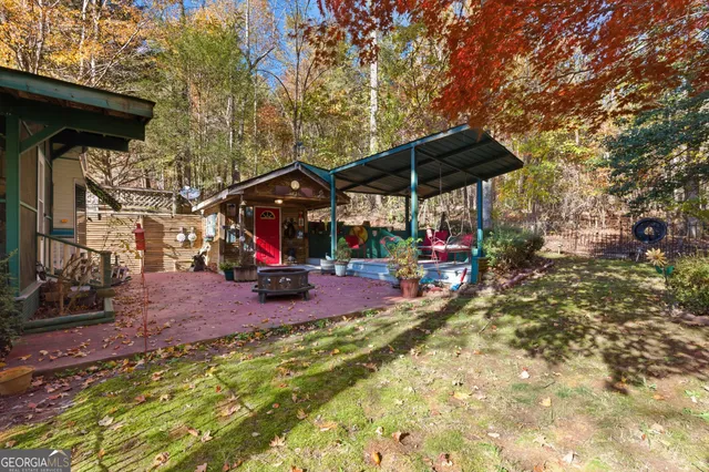 a view of outdoor space with deck and sitting area