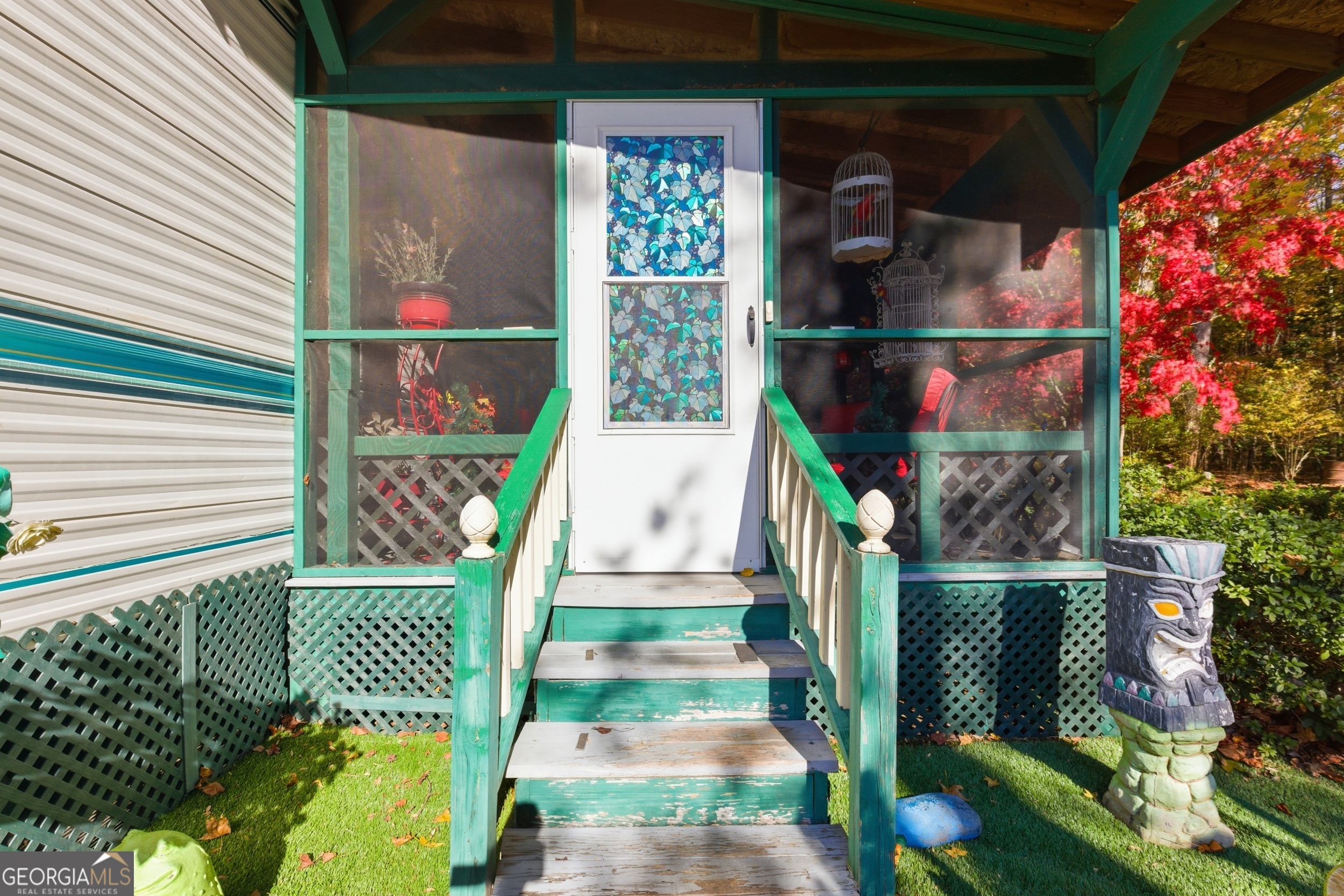 105 Holiday Loop Cleveland, GA 30528 - Photo 2 of 41 a house view with a garden space