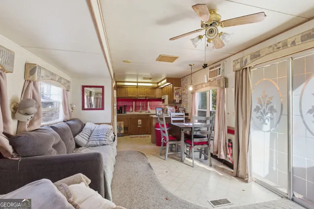 a kitchen with stainless steel appliances granite countertop a stove and a microwave
